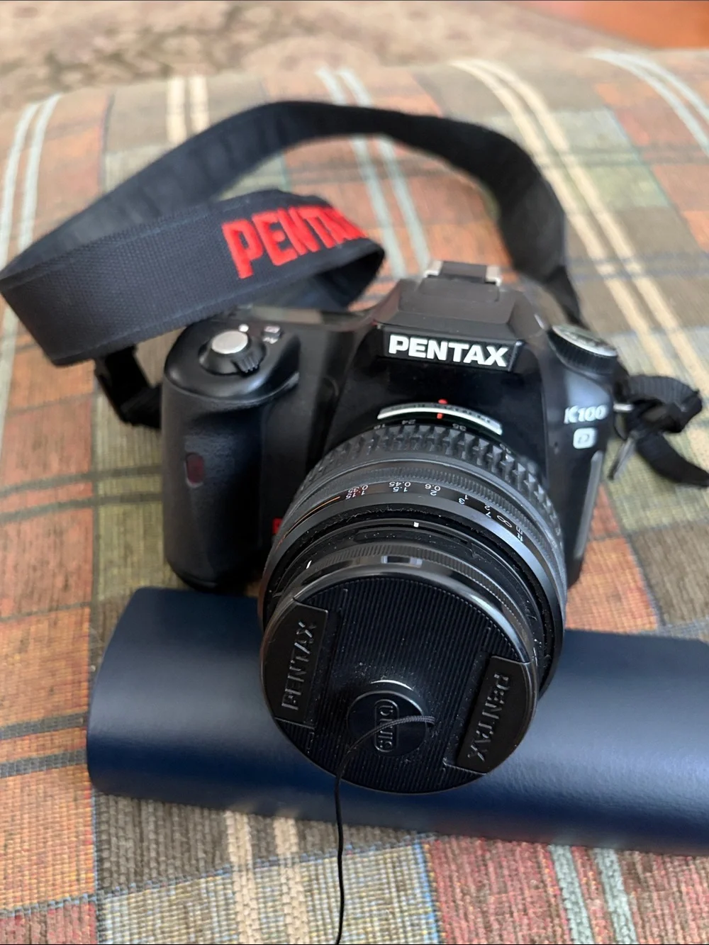 Pentax K 100 DDSLR camera plus original Pentax 18–55 mm kit lens. Tested working
